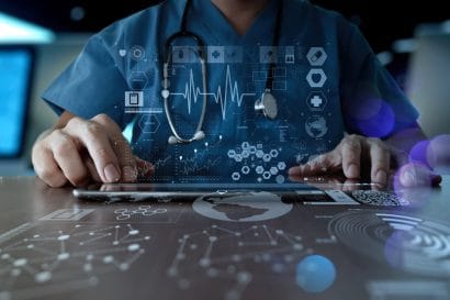 Medical coordination team reviewing patient data
